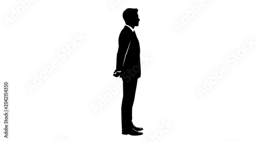 Photos Businessman silhouette standing in profile with hands behind back on