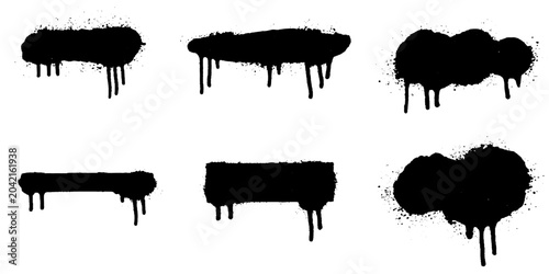 Photos A collection of black spray paint drips and splatters, in various shapes and sizes, create a dynamic and artistic graffiti-inspired graphic element