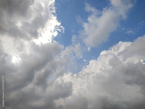 Blue sky with white clouds stock photo.