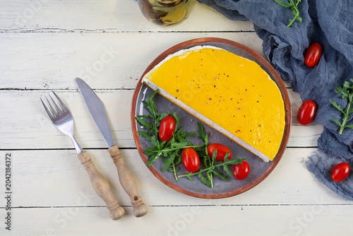 Omelette de la Mère Poulard with a light and airy texture. Fluffy egg dish served for breakfast