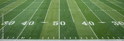 Fotografie American football field marking with yard lines and numbers.
