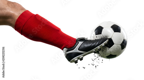 Soccer player with red sock and cleat hitting a soccer ball, creating dust particles on transparent background football ideas concept 