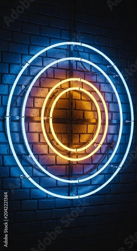 Three concentric neon circles glow against a textured brick wall