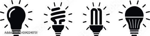 Photos Four black light bulb icons with radiating lines on white background lightbulb i