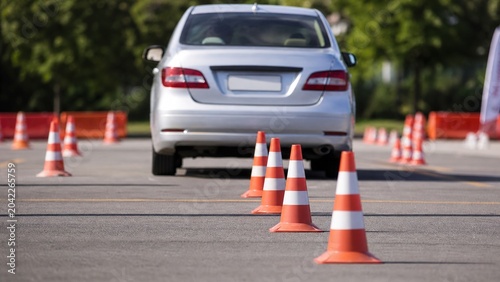 Konstfotografi Car maneuvering practice driving course instructional event parking lot eye-leve