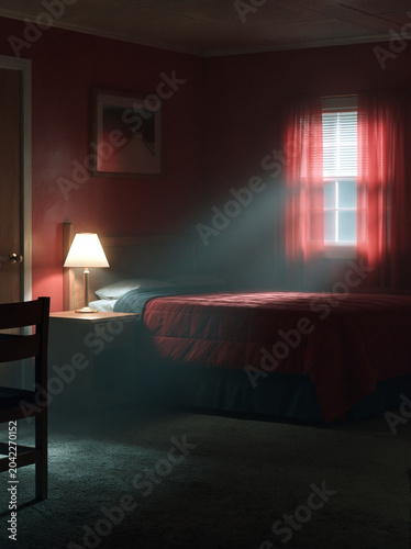 Sunlight streaming through window into cozy bedroom