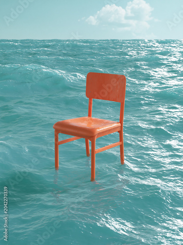 Single wooden chair standing in turquoise water