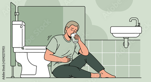 Man Experiencing Stomachache And Drinking While Sitting On Bathroom Floor