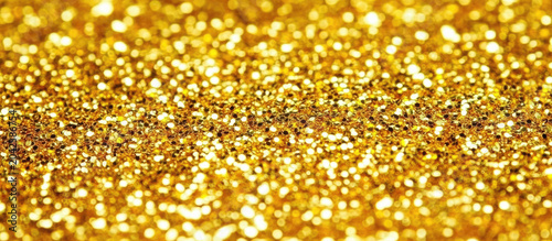 The image depicts a vibrant scene of Glitter, Shine, Sparkle, Gold, and Light.