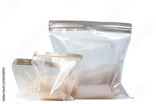 Elegant White Bag With Gold Zipper Among Two Companions. White or PNG Transparent Background.