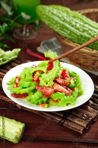 Fotografie Shandong Weifang bitter melon stir-fry with fresh sausage and green vegetables o