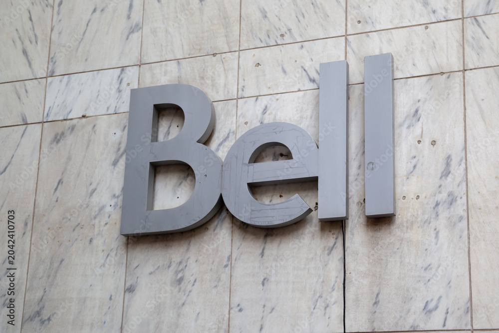 Naklejka premium Toronto, Ontario, Canada - October 22, 2017: Closeup Bell sign on Bell Telephone Building in Toronto, Ontario, Canada. Bell is Canada's largest telecommunications company.