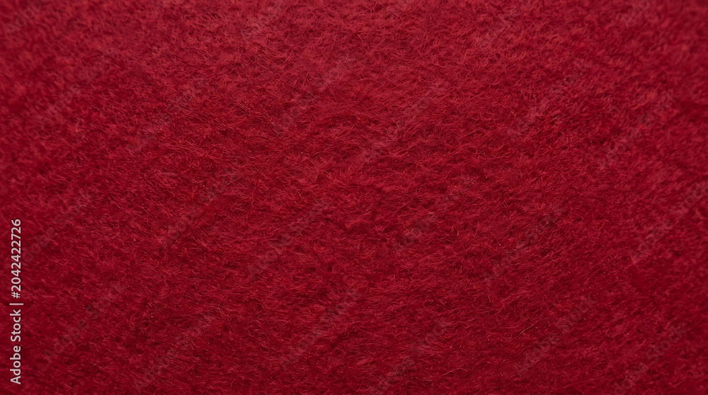Fototapeta premium Premium closeup of dark red wool felt texture background elegant soft textile surface for Christmas designs upholstery and fashion crafts