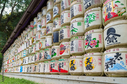 Tons of barrels of sake called Kazaridaru decorated with various patterns and inscriptions at Meiji Temple  Tokyo  Japan