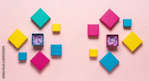Colorful gift boxes on pink background
