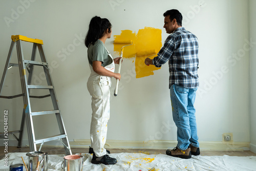 Photography Couple painting room yellow photo