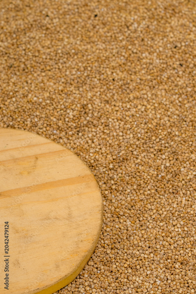 Obraz premium Quinoa seed with a spoon, a healthy food ingredient