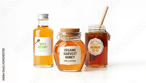 Honey bottles and jar showing organic harvest products