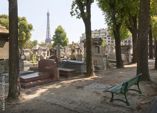 Passy Cemetery, with graves and Eiffel Tower in Paris
