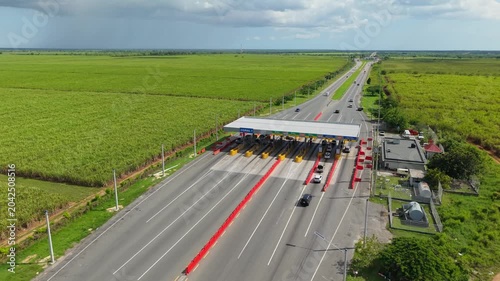 Aerial View of Modern Highway Surrounded by Greenery at Sunset