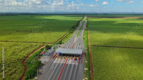 Aerial View of Modern Highway Surrounded by Greenery at Sunset