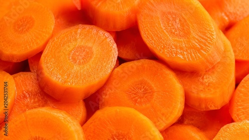 flat lay of fresh sliced carrots vegetable ingredients for healthy organic cooking