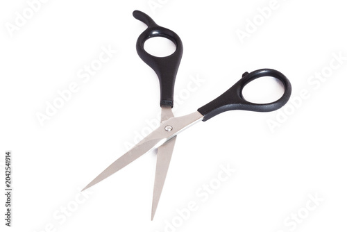Professional hair-cutting scissors isolated on a white background for barbering and men’s hairdressing