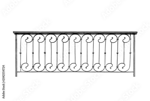 The façade of an antique wrought iron balcony.  B.