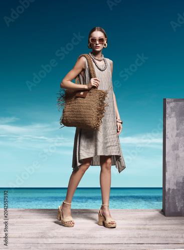 Obraz na płótnie Exquisite high fashion portrait of stunning Caucasian model wearing beige linen