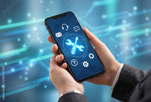 Professional hands holding smartphone with blue repair icon