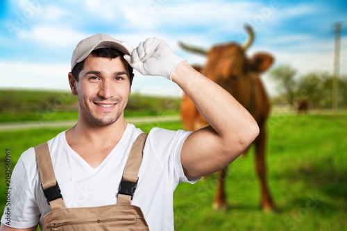 Foto Happy handsome senior farmer in glaves