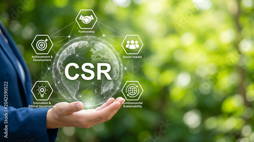 Hand holds glowing globe with CSR concept, symbolizing corporate social responsibility, sustainable business, and ethical environment practices