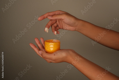 Hand modeling lotion, hand cream, putting on lotion