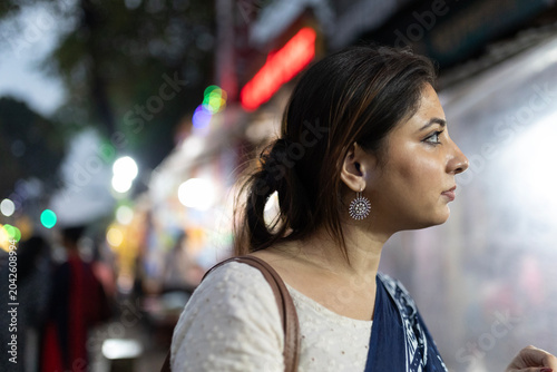 Indian woman roaming in the street market