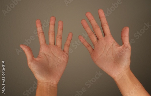 Palm of hands with long fingers