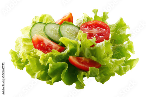 Fresh Green Lettuce With Sliced Cucumber And Tomato On Black Background