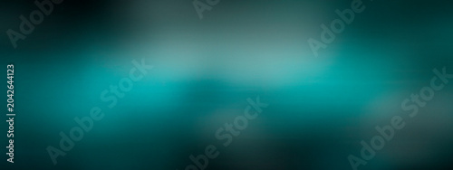 Фотография Teal and green hues diffuse into a soft haze over deep tones, creating a tranquil abstract backdrop for wellness branding, banners, or app screens