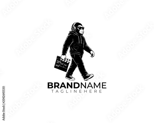 Walking Monkey Filmmaker Mascot Logo with Clapperboard