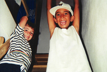 Vintage snapshot cousins playing in cabin during vacation