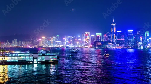 Stunning vibrant night cityscape of Hong Kong Victoria Harbour.
Signature view of Hong Kong, ferry pier at Tsim Sha Tsui, facing the Hong Kong Convention and Exhibition. Ferry, ship and boat riding on