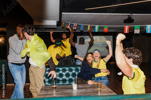 Diverse spectators celebrating world championship soccer match