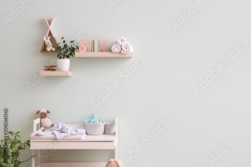 Interior of nursery with ch...
