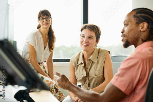 Group Discusses Business Ideas in Office