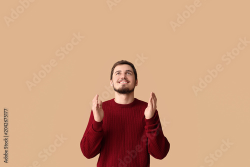 Religious man praying to Go...
