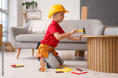 Cute little builder with to...