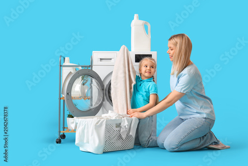 Happy mother and her little...