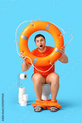 Shocked lifeguard with ring...