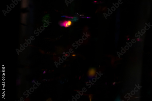 Colorful Abstract Bokeh Lights on Dark Background for Festive and Party Concepts