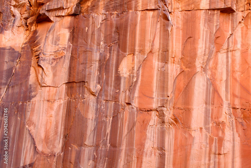Streaks of color along the Capitol Gorge rock wall of Capitol Reef National Park