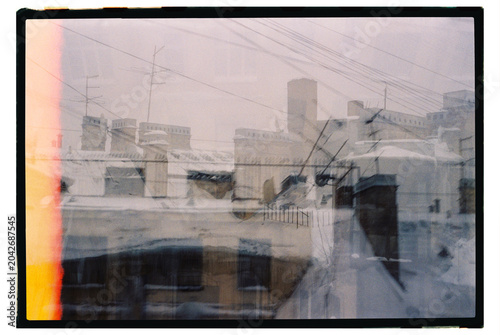 Snowy rooftops in a cold city on a winter day